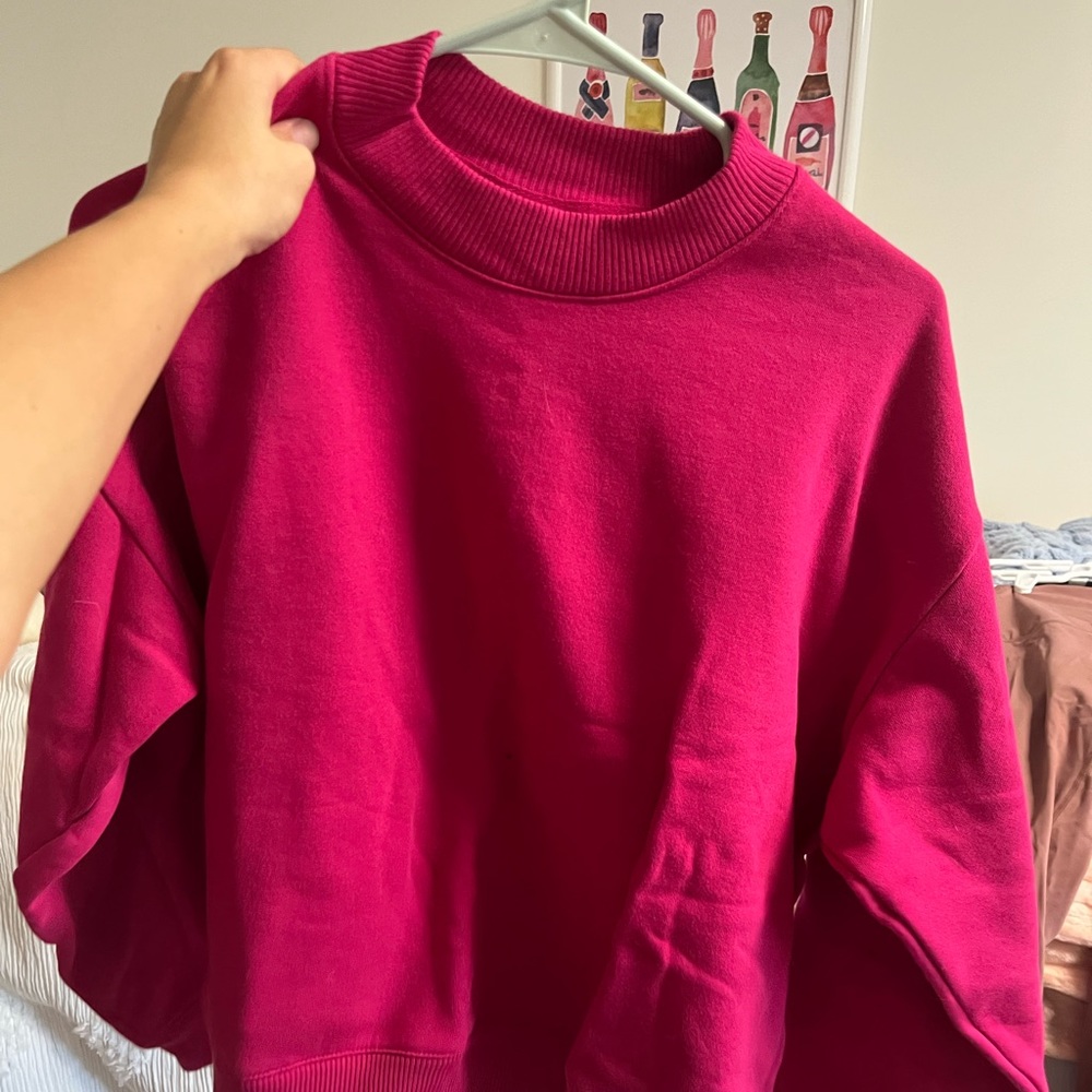 Pink target sweater
